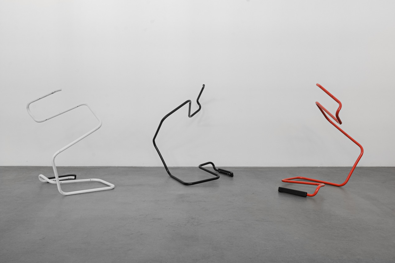 wade-guyton-untitled-action-sculptures-red-black-and-white-thonet-chair image